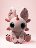 Pink plush toy Bloom with large eyes and a small horn on a cherry pink background Skybloom 